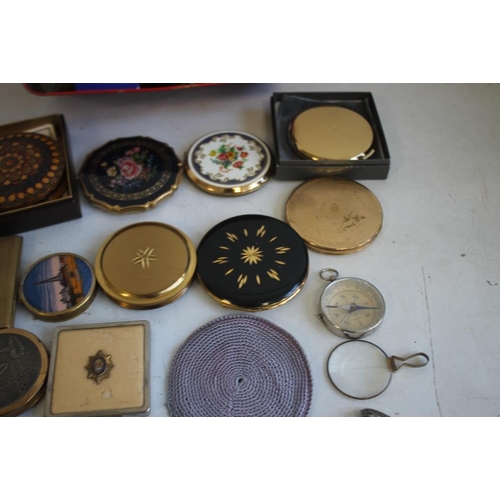 9 - A BOX OF CURIOS, to include 16 compacts, enamel pin badges, pen knives, compass etc