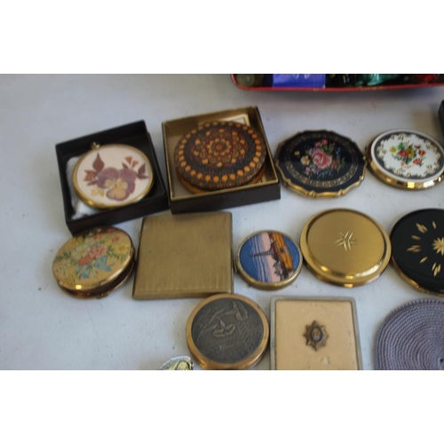 9 - A BOX OF CURIOS, to include 16 compacts, enamel pin badges, pen knives, compass etc