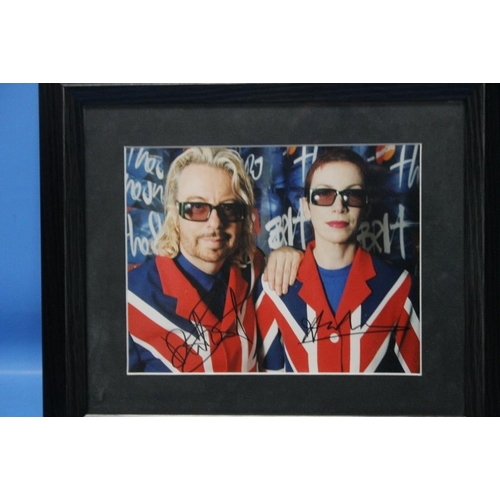 54 - EURYTHMICS SIGNED PHOTOGRAPH  with Certificate of Authenticity from 'Famous Names Autographs' dated1... 