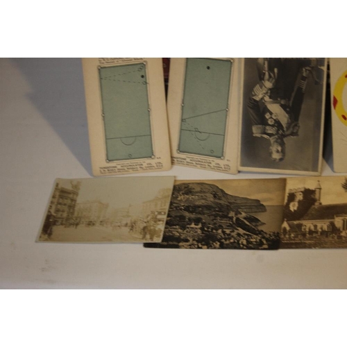 230 - A COLLECTION OF MIXED POSTCARDS. to include small albums, real photograph types and a part set of 