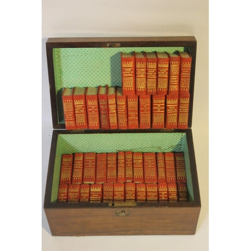 29 - A MINIATURE SET OF THE WORKS OF WILLIAM SHAKESPEARE, red leather, published by Allied Newspapers Ltd... 