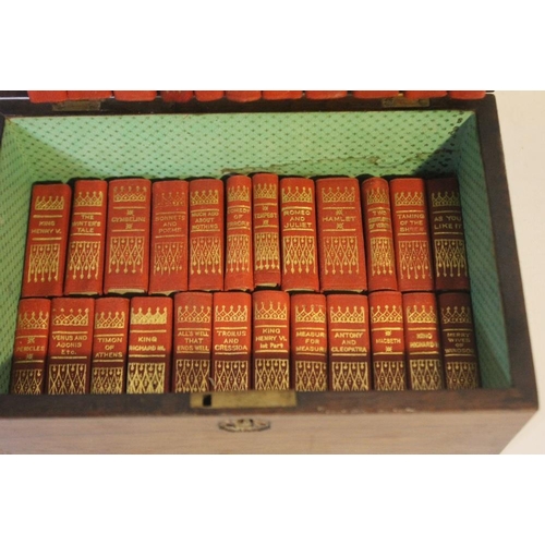 29 - A MINIATURE SET OF THE WORKS OF WILLIAM SHAKESPEARE, red leather, published by Allied Newspapers Ltd... 