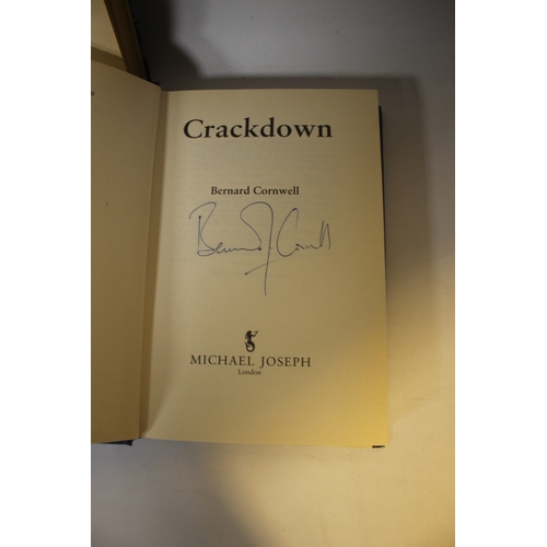 14 - BERNARD CORNWELL SIGNED FIRST EDITIONS, to include 'Wildtrack', 1988 'Crackdown' 1990, 'The Bloody G... 