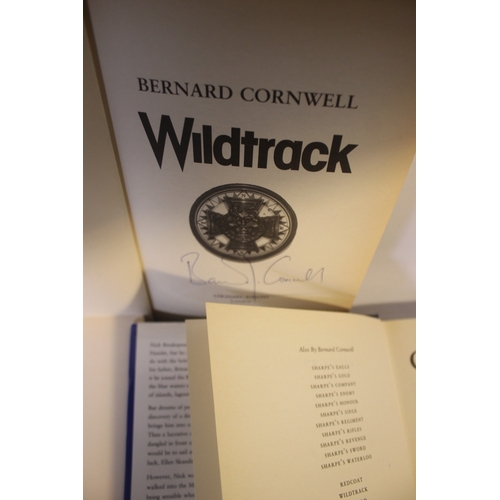 14 - BERNARD CORNWELL SIGNED FIRST EDITIONS, to include 'Wildtrack', 1988 'Crackdown' 1990, 'The Bloody G... 