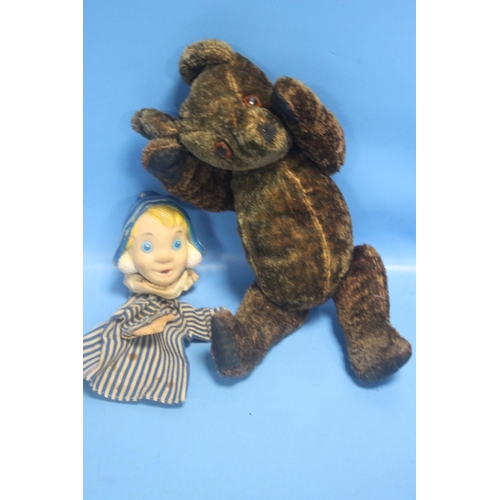 110 - A VINTAGE JOINTED TEDDY BEAR AND A FINGER PUPPET