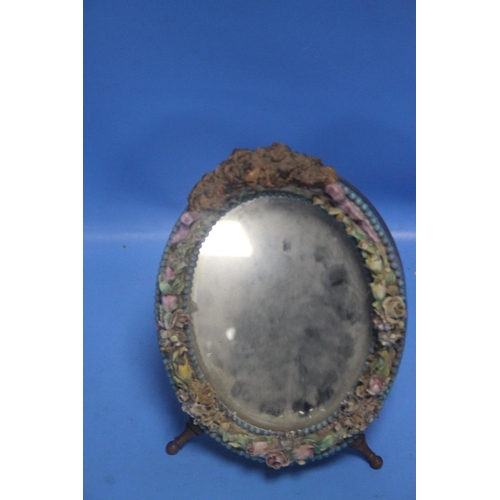 111 - A SMALL DECORATIVE MIRROR TOGETHER WITH A QUANTITY OF MARBLES