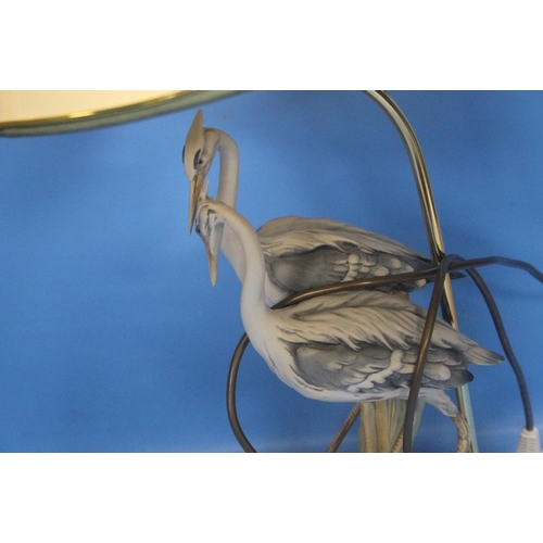 113 - A DECORATIVE TABLE LAMP WITH HERON FIGURES