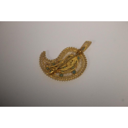 146 - AN 18CT GOLD BROOCH