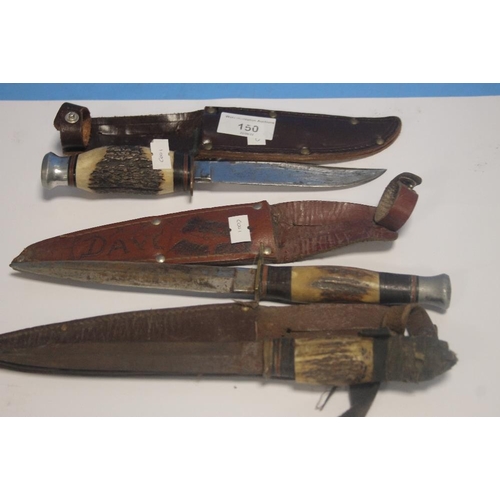 150 - THREE VINTAGE ANTLER GRIP HUNTING KNIVES IN LEATHER SHEATHS (3)