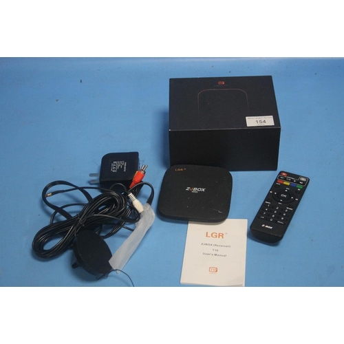 154 - A BOXED ZJ TV BOX PLUS REMOTE