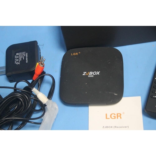 154 - A BOXED ZJ TV BOX PLUS REMOTE