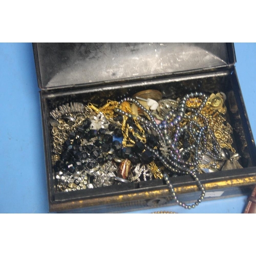 161 - A TIN OF ASSORTED COSTUME JEWELLERY AND A WRIST WATCH