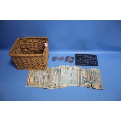 181 - A BASKET OF ASSORTED BRITISH AND WORLD COINS AND BANKNOTES