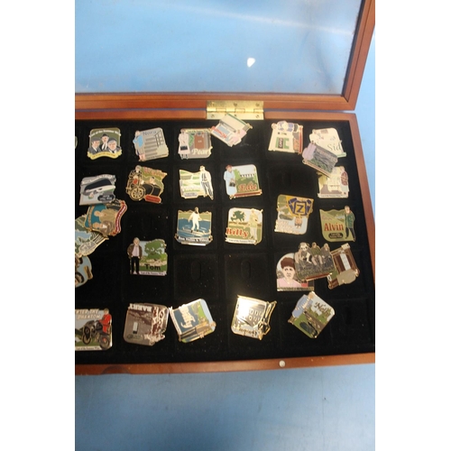 195 - A TRAY CONTAINING A QUANTITY OF DANBURY MINT ENAMELLED PIN BADGES