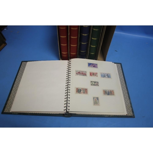 201 - FIVE STAMP ALBUMS CONTAINING MAINLY FOREIGN STAMPS