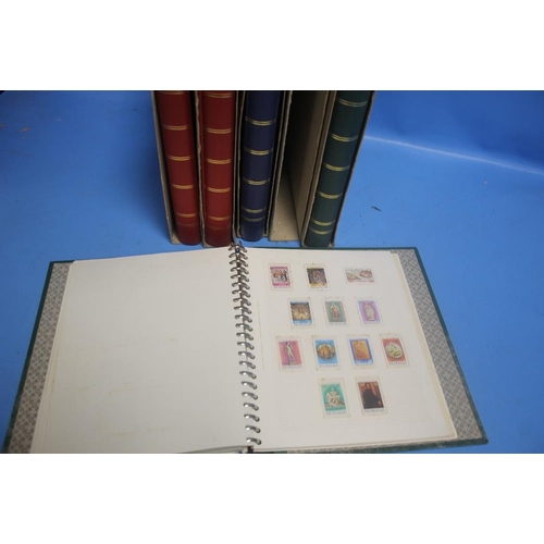 201 - FIVE STAMP ALBUMS CONTAINING MAINLY FOREIGN STAMPS