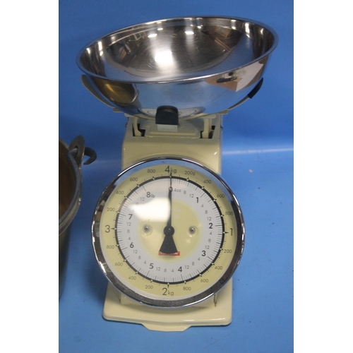 220 - A SOLID BRASS JAM PAN, SET OF SCALES AND A MANTLE CLOCK