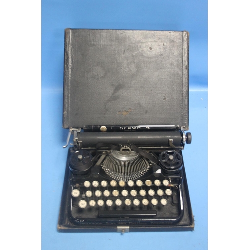 227 - A UNDERWOOD MINI TYPE WRITER IN CASE