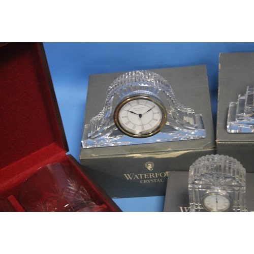 228 - A COLLECTION OF BOXED WATERFORD CRYSTAL GLASS MAINLY CLOCKS