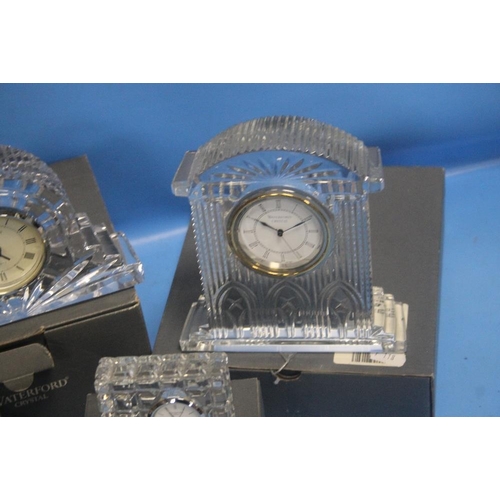 228 - A COLLECTION OF BOXED WATERFORD CRYSTAL GLASS MAINLY CLOCKS