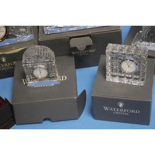 228 - A COLLECTION OF BOXED WATERFORD CRYSTAL GLASS MAINLY CLOCKS