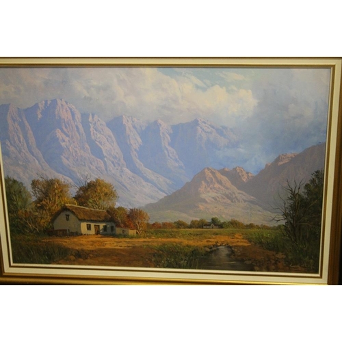 23 - A GILT FRAMED OIL ON CANVAS OF A SOUTH AFRICAN MOUNTAIN SCENE SIGNED BY  CASEY VAN DER LEEK 113 CM X... 