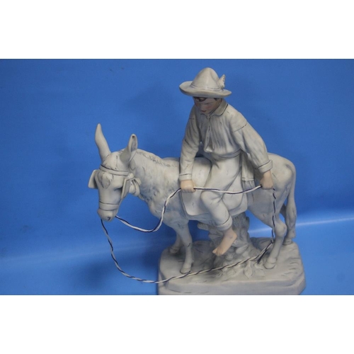 275 - A ROYAL DUX FIGURE OF A BOY ON A HORSE