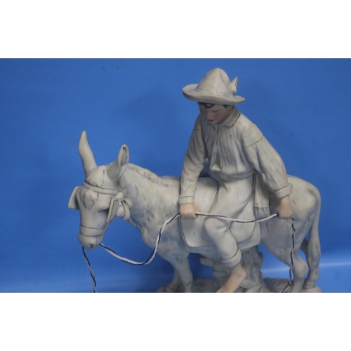 275 - A ROYAL DUX FIGURE OF A BOY ON A HORSE