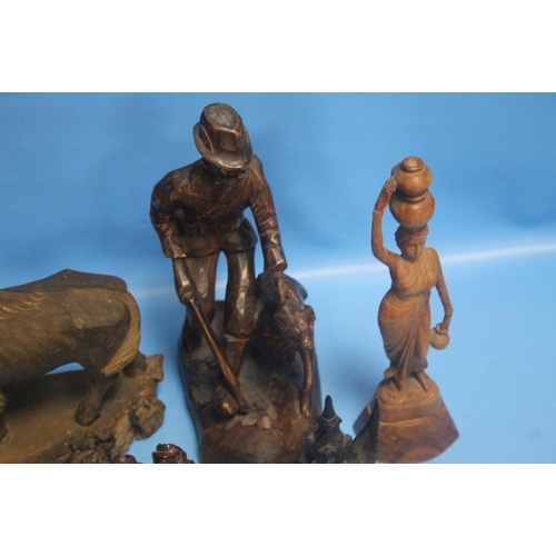 279 - A COLLECTION OF FIVE CARVED FIGURES