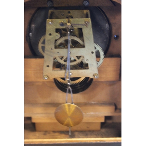 304 - AN OAK MANTEL CLOCK WITH PENDULUM NO KEY