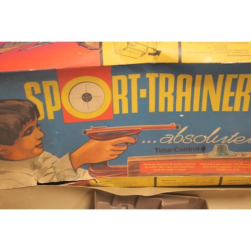 337 - A VINTAGE BOXED SPORT TRAINER, PARTS NOT CHECKED