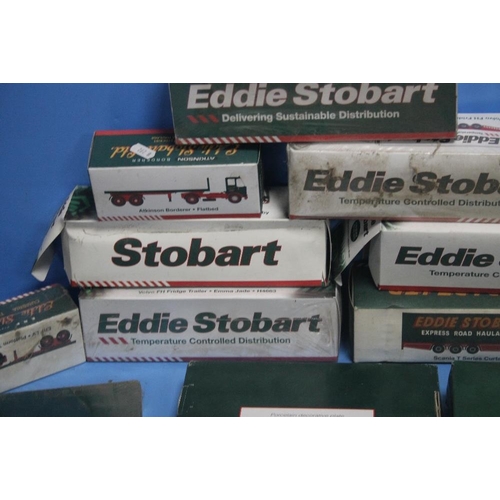 341 - A COLLECTION OF EDDIE STOBART WAGONS AND EDDIE STOBART COLLECTORS PLATES