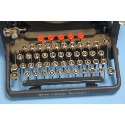 347 - A ANTIQUE REMINGTON UPRIGHT TYPEWRITER