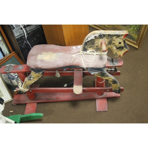 370 - A VINTAGE WOODEN ROCKING HORSE