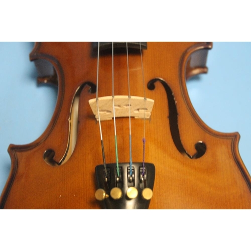 387 - FOUR CASED VIOLINS