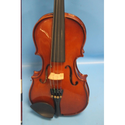 388 - FOUR CASED VIOLINS