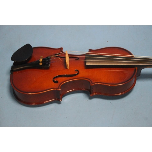 388 - FOUR CASED VIOLINS