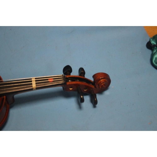 388 - FOUR CASED VIOLINS