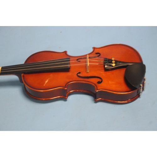 388 - FOUR CASED VIOLINS