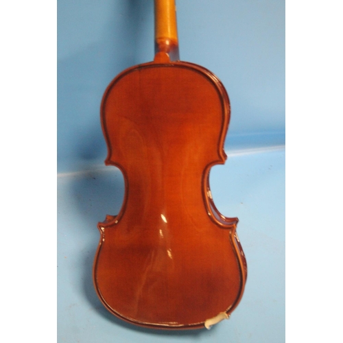 388 - FOUR CASED VIOLINS