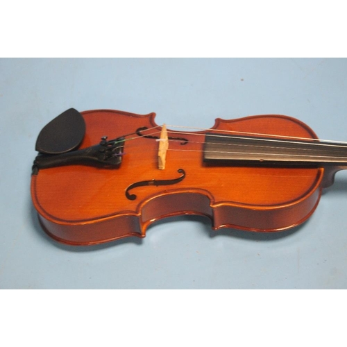 390 - FOUR CASED VIOLINS