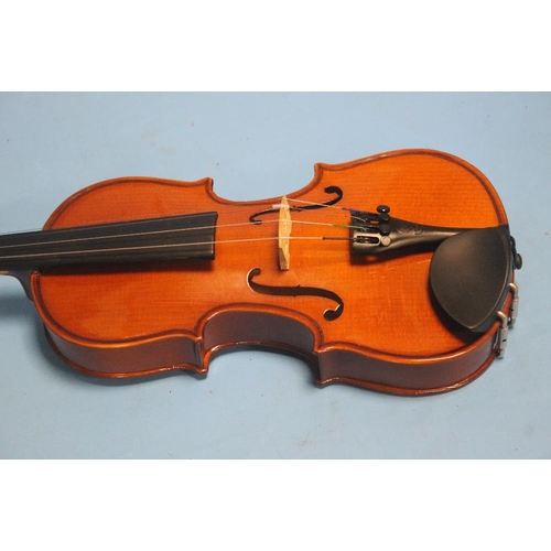 390 - FOUR CASED VIOLINS