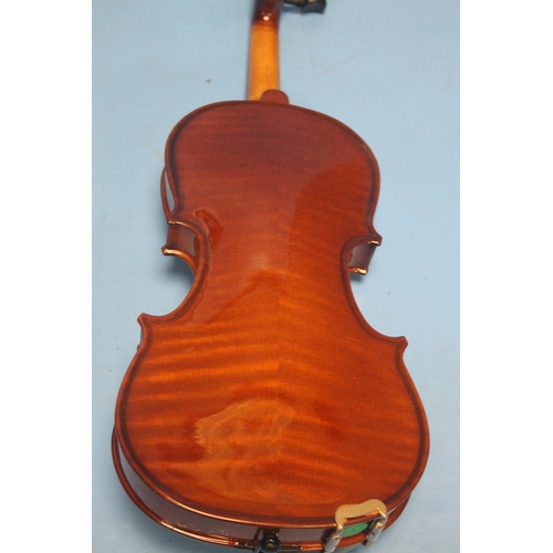 391 - FOUR CASED VIOLINS