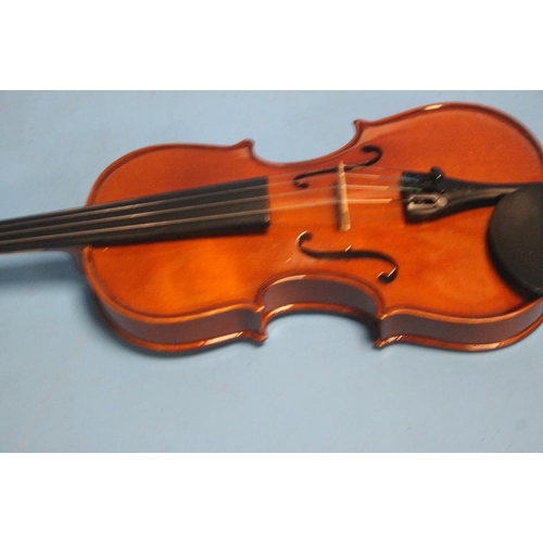 392 - FOUR CASED VIOLINS