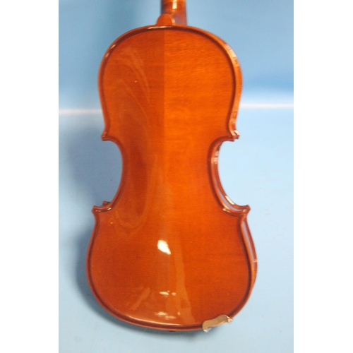 392 - FOUR CASED VIOLINS