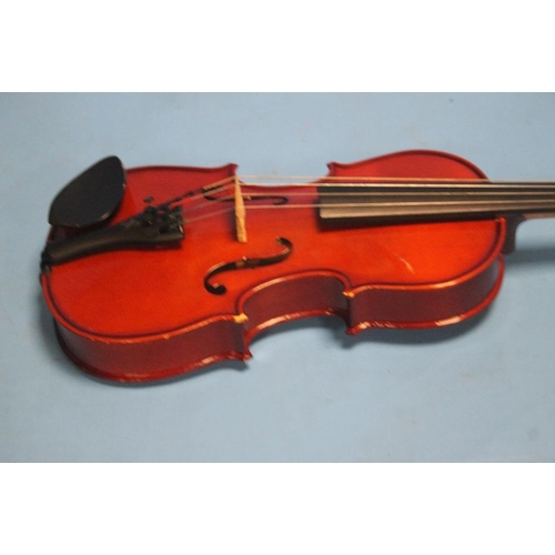 394 - FOUR CASED VIOLINS