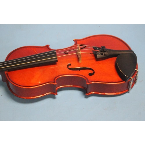 394 - FOUR CASED VIOLINS