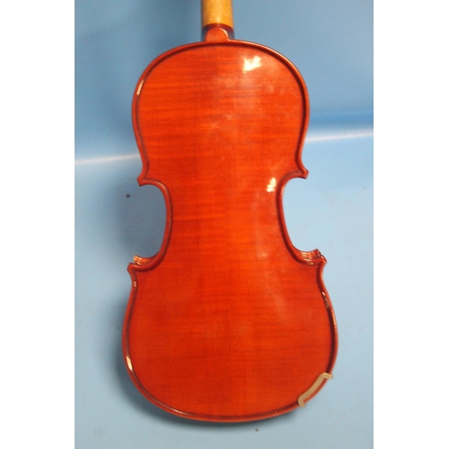 394 - FOUR CASED VIOLINS