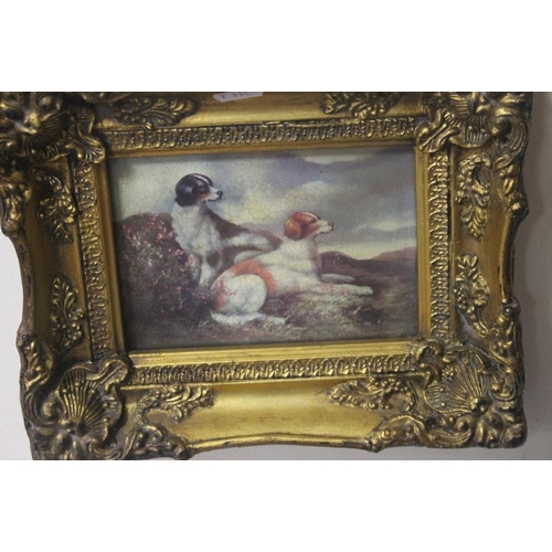 41 - A FRAMED AND GLAZED REPRODUCTION LITHOGRAPH OF DOGS 28 CM X 22 CM