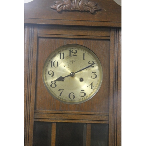 523 - A OAK HANGING WALLCLOCK